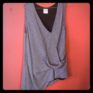 Asymmetrical black and white polka dot blouse